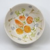 Barbara Guldenaar: Oogst (2023) (onder)glazuur op aardewerk, Ø16 x 6 cm. 110 euro