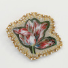 Marianne Aulman: Broche tulp, mixed media, 7 x 5 cm. 35 euro