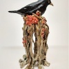 Gerrie Lulof: Merel in lijsterbes (2022) paperclay, 23 x 16 x 10 cm. 225 euro