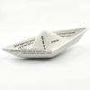 Jacqueline Tijssen: Vouwbootje, porselein, 8 x 17 x 10 cm. 50 euro