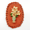 Jeannet Klement: Gestreepte vaas, gele bloemen (2024), aardewerk, 18 x 13 x 2 cm. 150 euro