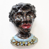 Jeannet Klement: Wandportretje (2022), aardewerk, 12 x 9 x 4 cm. 75 euro