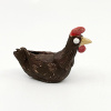 Jolet Leenhouts: Kip, keramiek, 5 x 7 x 3 cm. 35 euro