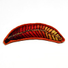 Marianne Aulman: Broche veer, mixed media, 3 x 8 cm. 35 euro