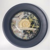 Marianne Aulman: Slak, mixed media, Ø22 cm. 150 euro
