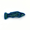 Marianne Aulman: Broche vis, mixed media, 4 x 8,5 cm. 35 euro
