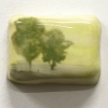 Marieke Peters: A dot next to a giant, mixed media op keramiek, 5,5 x 7,5 x 2 cm. 130 euro