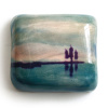 Marieke Peters: The space between, mixed media op keramiek, 5,5 x 6,5 x 2 cm. 130 euro