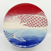 Maurice Christo van Meijel: NL Maatjes (2025) (onder)glazuur op aardewerk, Ø21 cm. 100 euro