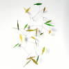 Maurice Christo van Meijel: Schooltje geel-groen (2025) papier, drukinkt en draad, circa 30 x 20 x 10 cm. 150 euro