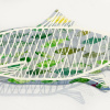 Maurice Christo van Meijel: Gesneden haring (2026), drukinkt en gesneden papier, 15 x 51 x 6 cm. 70 euro