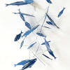 Maurice Christo van Meijel: Blauw schooltje (2026) papier, drukinkt en draad, circa 30 x 15 x 10 cm. 150 euro