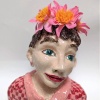 Jeannet Klement: Be sure to wear some flowers in your hair (2024) aardewerk/paperclay, 30 x 26 x 18 cm. 875 euro