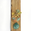 Wendy Limburg: In de zee (2025), aardewerk op hout, 41 x 11 cm. 65 euro